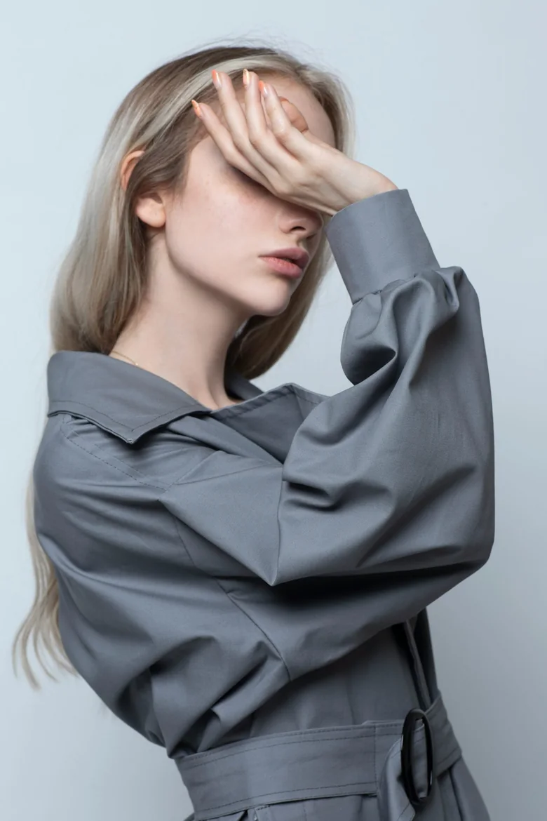 Photograph, editorial grey trench